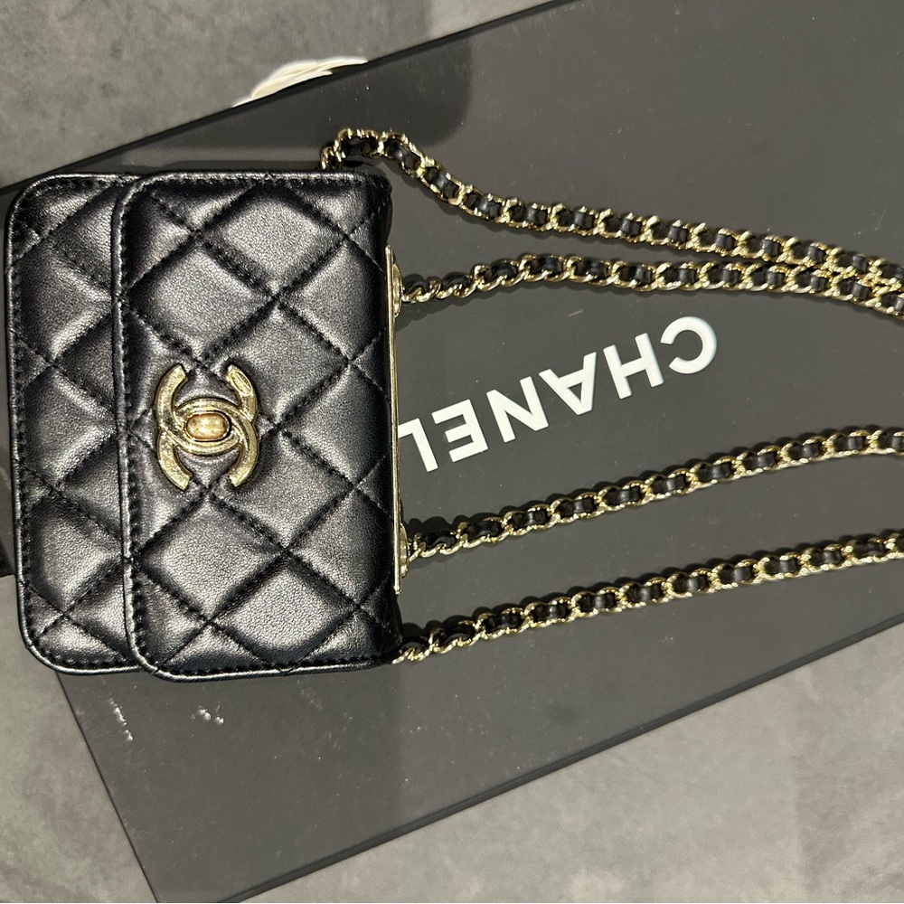 CHANEL Black Quilted Bag with Gold Accents